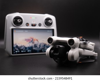 May 2022, UK: DJI Mini 3 Pro Drone With RC Pro Controller On Black.