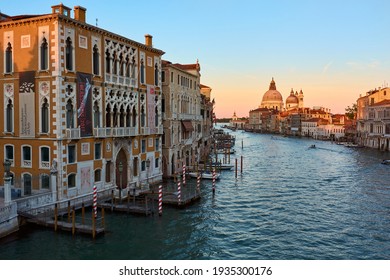 MAY 21, 2017 - VENICE, ITALY: View of the Grand Canal and Santa Maria della Salute, famous Roman Catholic cathedral, seen from Ponte Dell'Accademia.