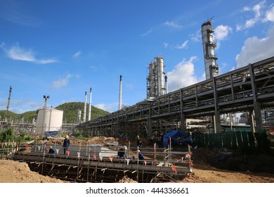 MAY 22, 2015: SRIRACHA, THAILAND. View Of New Construction Of Electrical Power Switch-gear And Power Plant In Area Of Oil Refinery Plant On Bright Blue Sky And A Sunny Day.