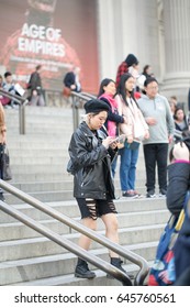 May 22, 2017.  New York City, New York.  Hip Young Girl On Steps In Front Of The Met.  