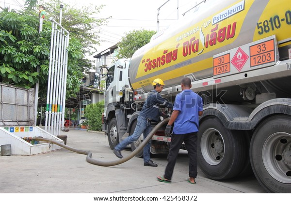 May 23, 2016 : The engineer\
from Watchara Up Petroleum is refuel the oil from Oil truck into\
the tank in PTT Public Company Limited, gas station in trat,\
Thailand