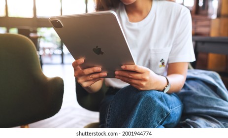 May 24th 2021 : A Woman Holding And Using Apple New Ipad Pro 2020 Digital Tablet , Chiang Mai Thailand