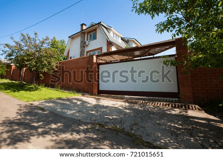 May 26, 2016; Moscow district, Russian Federation: Gates of a garage in a suburban house in the suburbs of Moscow