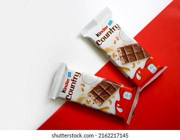 May 26, 2022 Ukraine City Kyiv Chocolate Bar Kinder Country On A Colored Background