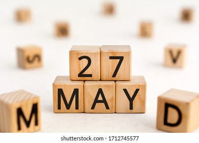 May 27 - from wooden blocks with letters, important date concept, white background random letters around - Shutterstock ID 1712745577