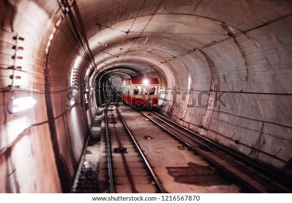 MAY 28, 2013 Toyama, Japan - Korobeko tunnel\
with Kurobe Cable Car running between Kurobe Dam and Kurobedaira,\
only underground cable car in\
Japan