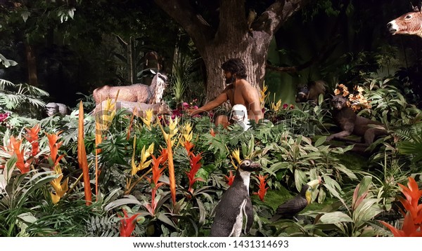 May, 29, 2016,\
Petersburg, KY, The, Creation, Museum, Adam in the garden of Eden\
surrounded by animals, on\
display