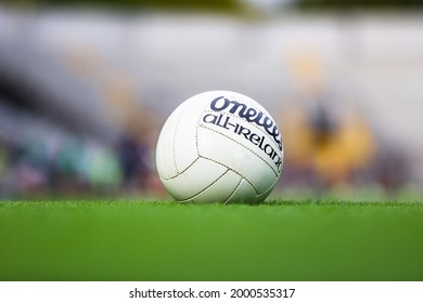 May 29th, 2021, Cork, Ireland - An O'Neills All Ireland Gaelic Football Ball Lies In The Grass With An Out Of Focus Background