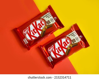 May 3, 2022 Ukraine, Kyiv City Kit Kat Chocolate Bar On Colored Background, Produced By Nestle Company