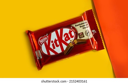 May 3, 2022 Ukraine, Kyiv City Kit Kat Chocolate Bar On Colored Background, Produced By Nestle Company