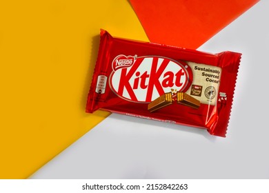 May 3, 2022 Ukraine, Kyiv City Kit Kat Chocolate Bar On Colored Background, Produced By Nestle Company