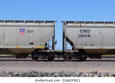 May 4 2022 - Maricopa, Arizona: Two connected Union Pacific grain train cars on railway near maricopa arizona