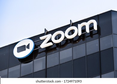May 6, 2020 San Jose / CA / USA - Close up of Zoom sign at their headquarters in Silicon Valley; Zoom Video Communications is a company that provides remote conferencing services using cloud computing