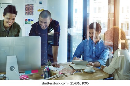 May The Best Collaboration Win. Shot Of Businesspeople Working In Teams In A Modern Office.