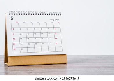 May Calendar 2021 on wooden table background