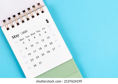 The May calendar 2022 on blue background.