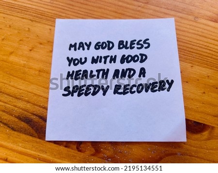 May God bless you with good health and a speedy recovery. Handwritten message.