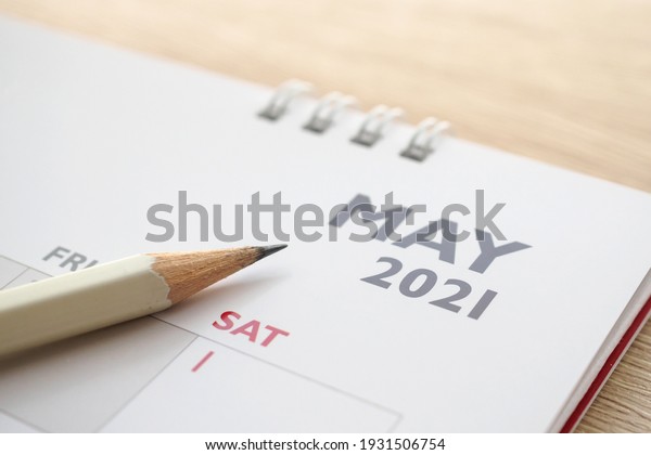 May month on 2021 calendar\
page with pencil business planning appointment meeting\
concept