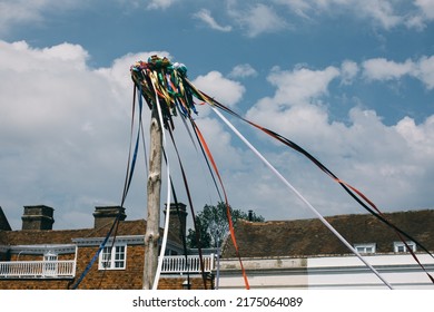 May Pole And Sky With Buildings