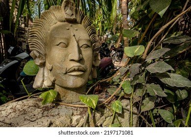 Mayan Sculpture In Mexico With Leaves