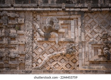 Mayan style fretwork, in an archaeological zone, approach to Mayan buildings, view of the details made by the Mayans in pre-Hispanic times, glyphs and representations of deities