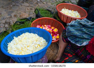 A Mayan woman is showing her flower petals at the Chichicastenango market in Guatemala.