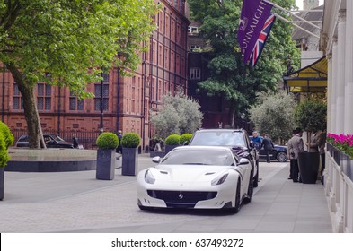 MAYFAIR, LONDON- 9 MAY 2017: Expensive luxury cars parked outside Mayfair's 5 star Connaught Hotel 