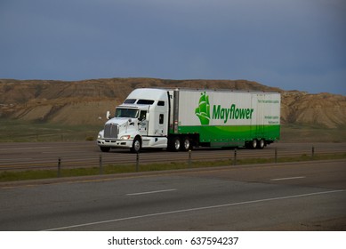 Mayflower Trucking / Moving Company
A White Kenworth Tractor Pulls A Green And White Trailer.

May 7th, 2017
Rock Springs, Wyoming, USA