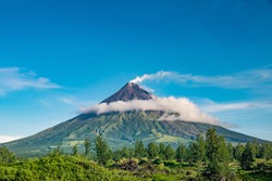 Mayon Volcano Is An Active Stratovolcano In The Province Of Albay In Bicol Region, On The Island Of Luzon In The Philippines. Renowned As The "perfect Cone" Because Of Its Symmetric Conical Shape