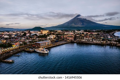 Mayon Volcano With A Front Of Legazpi Port. 