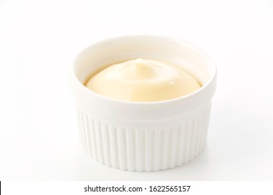 mayonnaise in a cocotte on white background