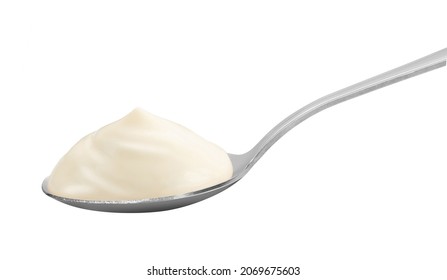 Mayonnaise In Metal Spoon Isolated On White