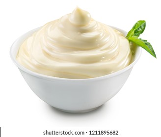 Mayonnaise swirl in white bowl. File contains clipping path.