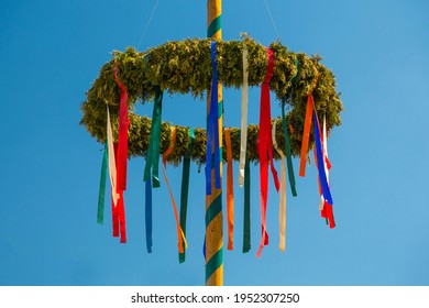 Maypole with colorful ribbons, Coswig-Kötitz, Saxony, Germany