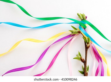Maypole Day. May Day. Decoration with colored ribbons. Spring. 