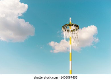 Maypole with heaven and cloud in beackground