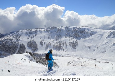 MAYRHOFEN, AUSTRIA - MARCH 12, 2019: People visit Mayrhofen ski resort in Tyrol region, Austria. The resort is located in Zillertal valley of Central Eastern Alps (Zentralalpen).
