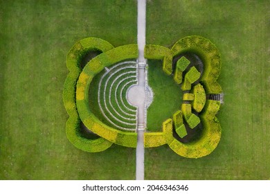 Maze Of Bushes In Botanical Park - Nature Background 
Labyrinth From Above. Aerial View
Natural Maze From The Hedge, Good Fun And Entertainment