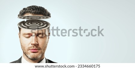 Maze of reason and psychology concept with man head with labyrinth on light grey background