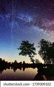 Mazowieckie, Poland - 05 22 2020: Milky Way And Satellites Visible At Night Sky From Earth, Central Europe. United States Space Force. Radarsat GPS Network Internet 5G Starlink Space X.