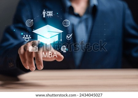 MBA, Master of Business Administration program concept. Courses to developing skills in business and management fields. Businessman touching MBA icon on virtual screen.