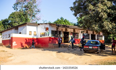 Mbabane, Swaziland, 26th May - 2019: Roadside Bottle Shop With People Outside