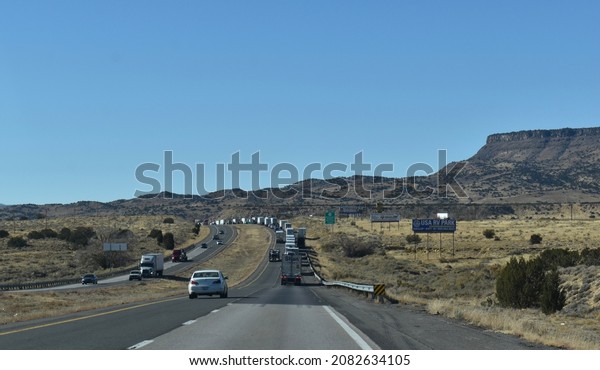 McCartys, New Mexico, USA - November 21, 2021:\
On a Desert Highway, Westbound Traffic Begins to Slow Down Due to\
an Accident on I-40 Outside Grants,\
NM