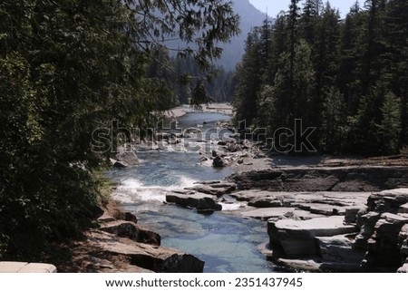 McDonald Creek as it flows into McDonald lake.  This is a glacier fed body of water that can be found on the western side of Glacier National park in Montana.  Accessible from the Going to the Sunroad