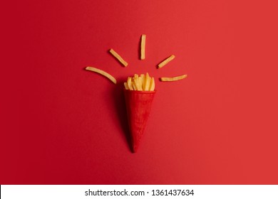 McDonald's menu: French fries in a cup on a red background. Minimal concept - Powered by Shutterstock