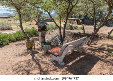 MCGREGOR, SOUTH AFRICA - APRIL 8, 2021: A memorial cairn for donkeys at Eseltjiesrus Donkey Sanctuary near McGregor in the Western Cape Province. A bench is visible