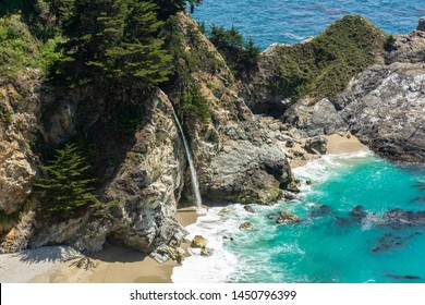 McWay Falls, Big Sur, California, USA. Scenic Drive On Highway One. Due To The High Cliffs Surrounding The Cove, The Beach Is Inaccessible Except By Boat, And May Be Covered By Surf At High Tide.