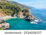 McWay Falls on Highway 1 and Big Sur along the Pacific Ocean coast, beautiful landscape and aerial view, sunset, sunrise, fog. Concept, travel, vacation, weekend.