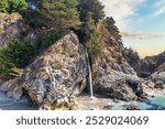 McWay Falls on Highway 1 and Big Sur along the Pacific Ocean coast, beautiful landscape and aerial view, sunset, sunrise, fog. Concept, travel, vacation, weekend.