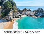 McWay Falls on Highway 1 and Big Sur along the Pacific Ocean coast, beautiful landscape and aerial view, sunset, sunrise, fog. Concept, travel, vacation, weekend.